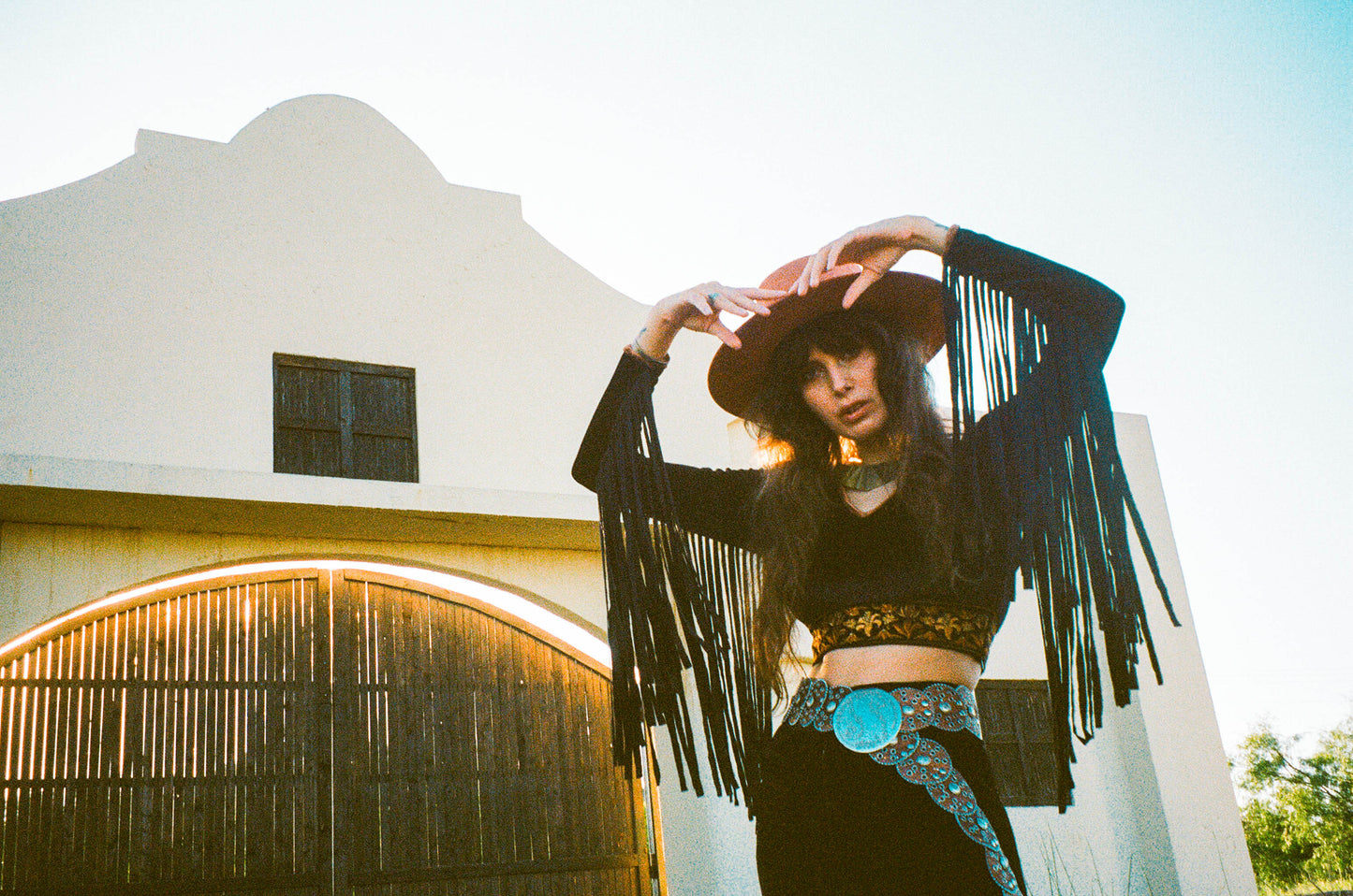The Orchid Fringe Black Crop Top in Gold Dust Woman
